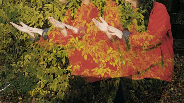 woman preforming Tai Chi outdoors